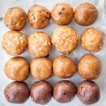 Protein balls made with almond butter in several different flavor variations.