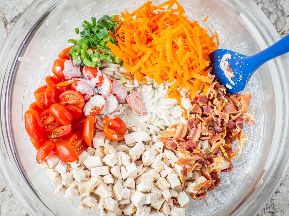 Remaining ingredients added to the large bowl with pasta.