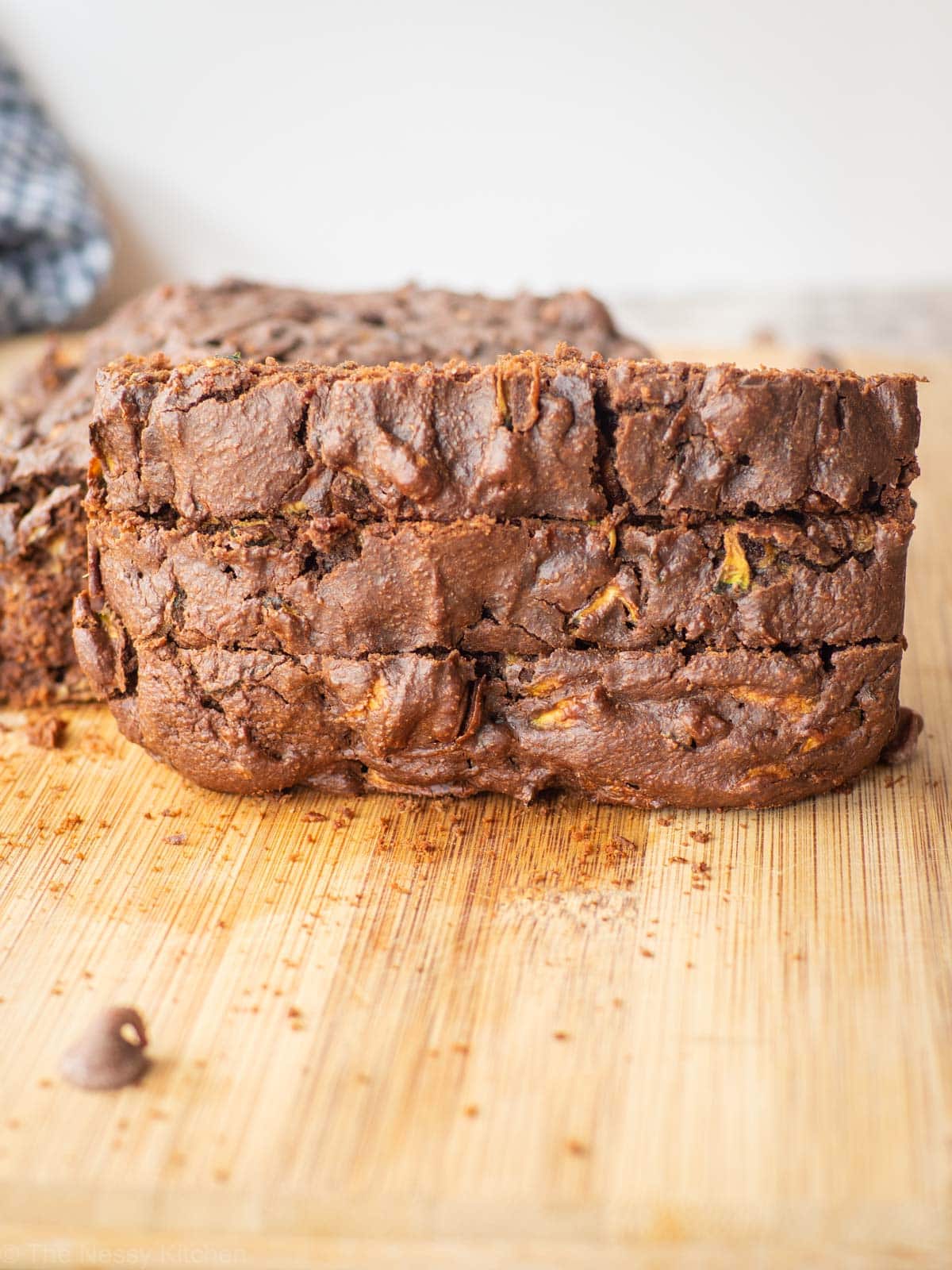 Slices of chocolate zucchini bread stacked.