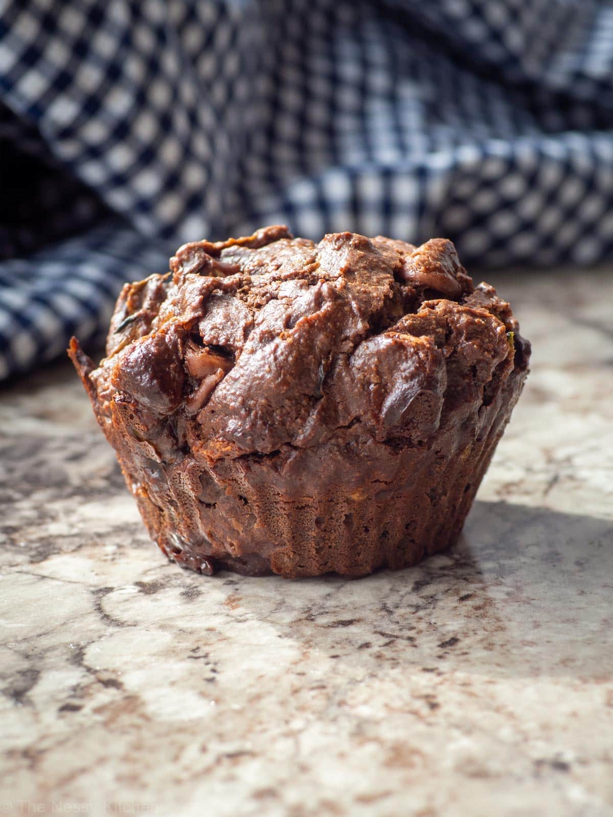 Chocolate zucchini muffin made with oat flour.