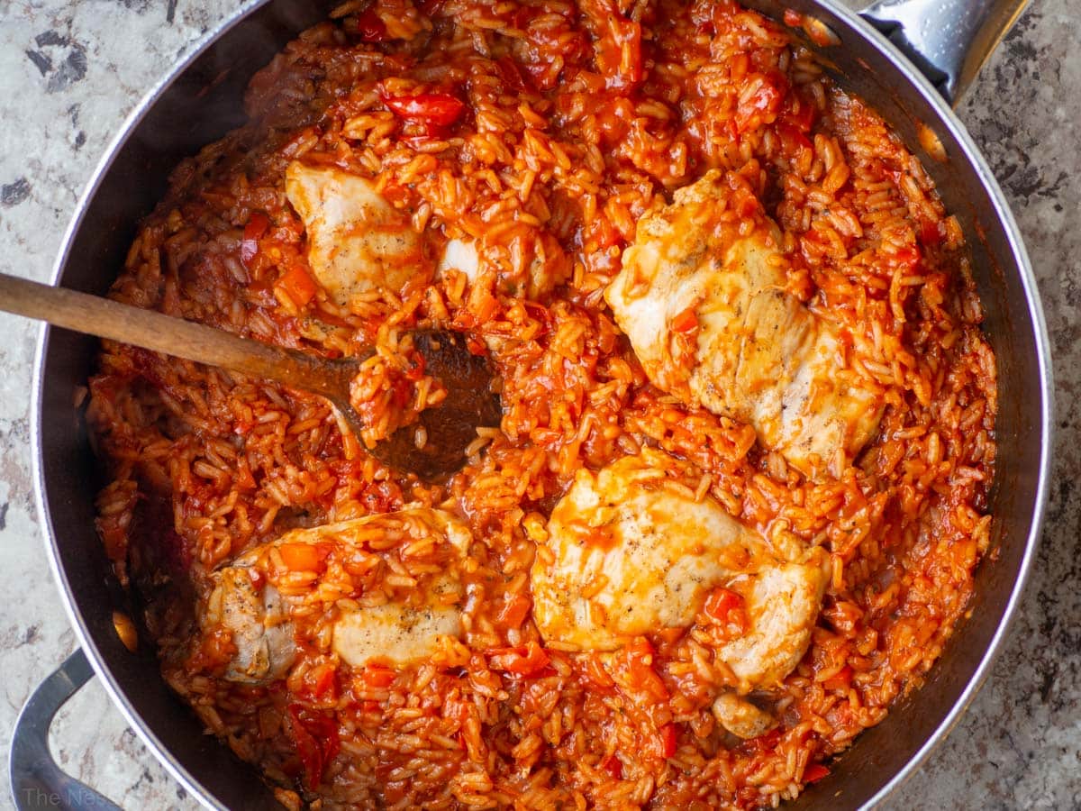 Cooked tomato basil chicken and rice.