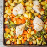Sheet pan with chicken and vegetables.