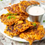 Sweet potato fritters on a plate.