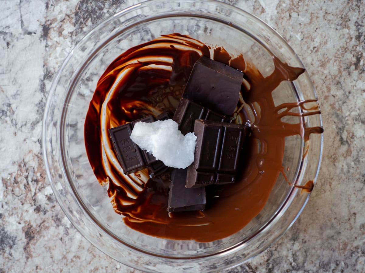 Remaining chocolate and coconut oil in a bowl to melt.