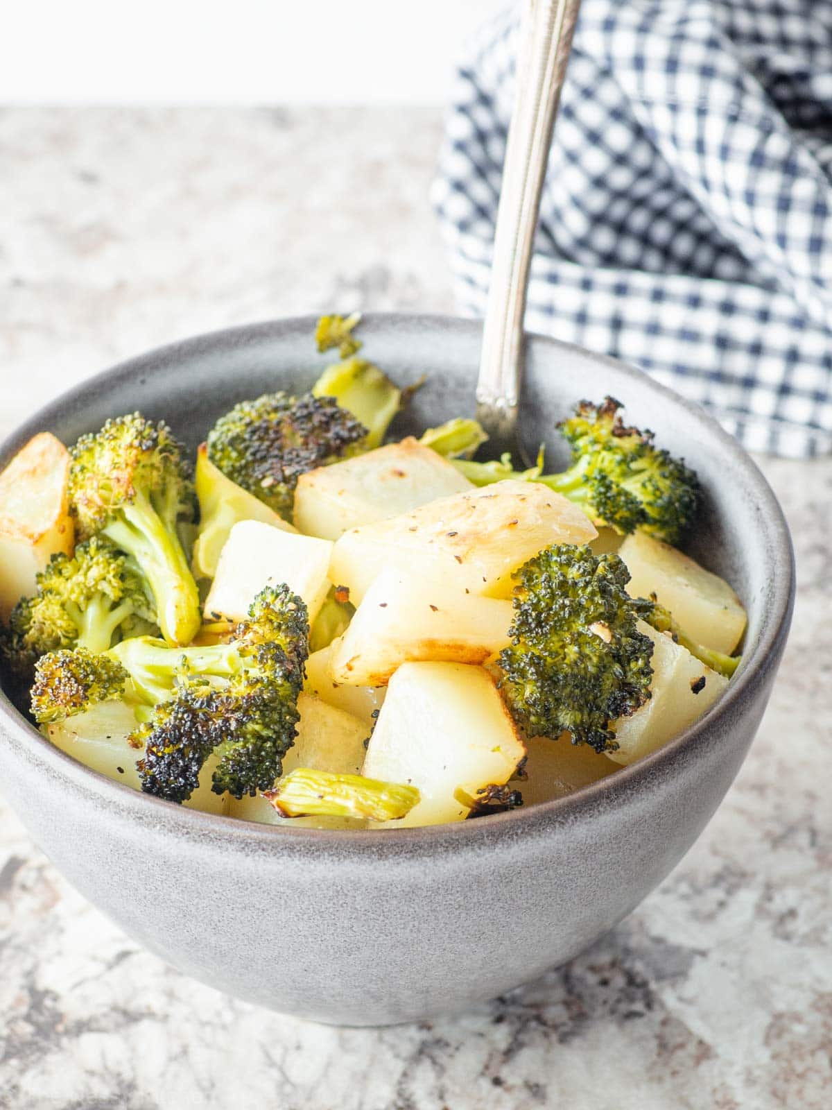 Potatoes and broccoli in a bowl.
