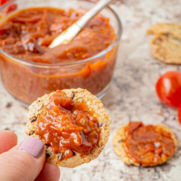 Cherry tomato jam on a cracker.