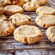 Peanut butter cookies on a cooling rack.