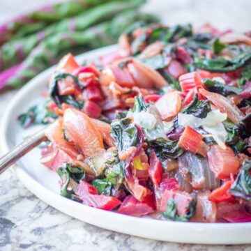 Swiss chard on a plate with parmesan.