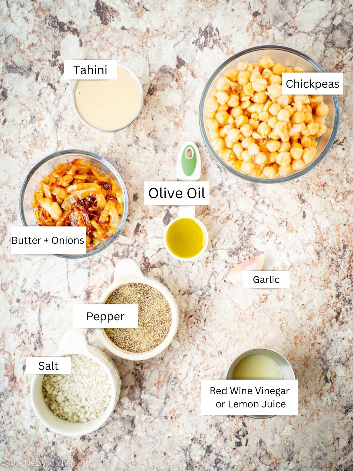 Ingredients measured out for caramelized onion hummus.