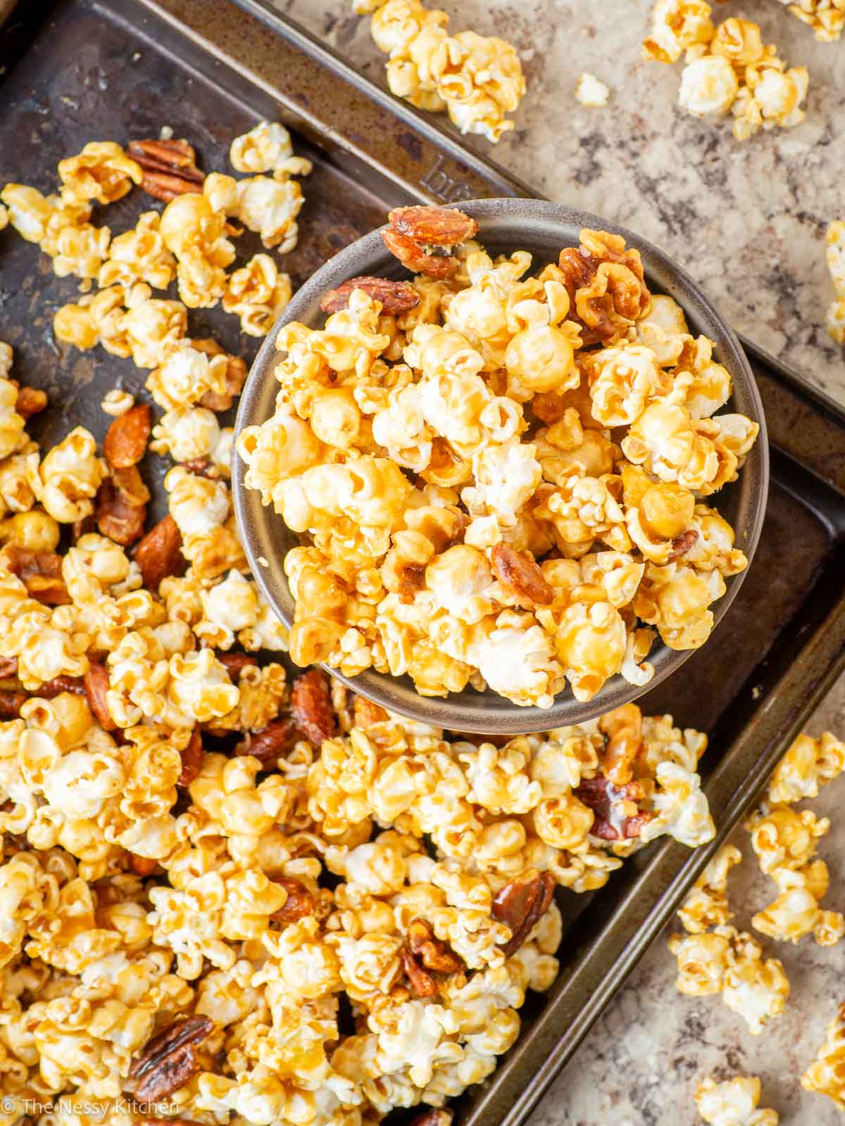 Maple poppycock being dished out into a serving bowl.