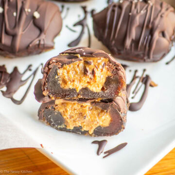 Date stuffed with peanut butter and topped with chocolate.