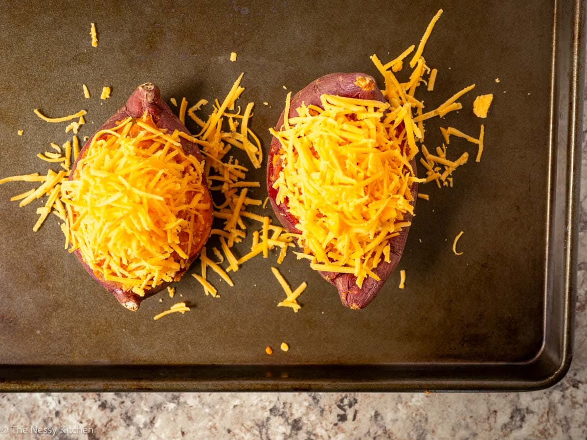 Potatoes topped with cheese.