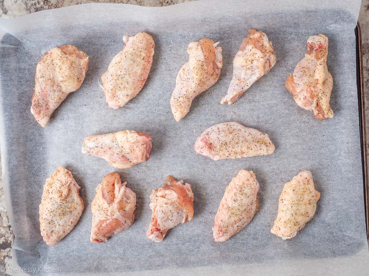 Wings on a baking sheet.