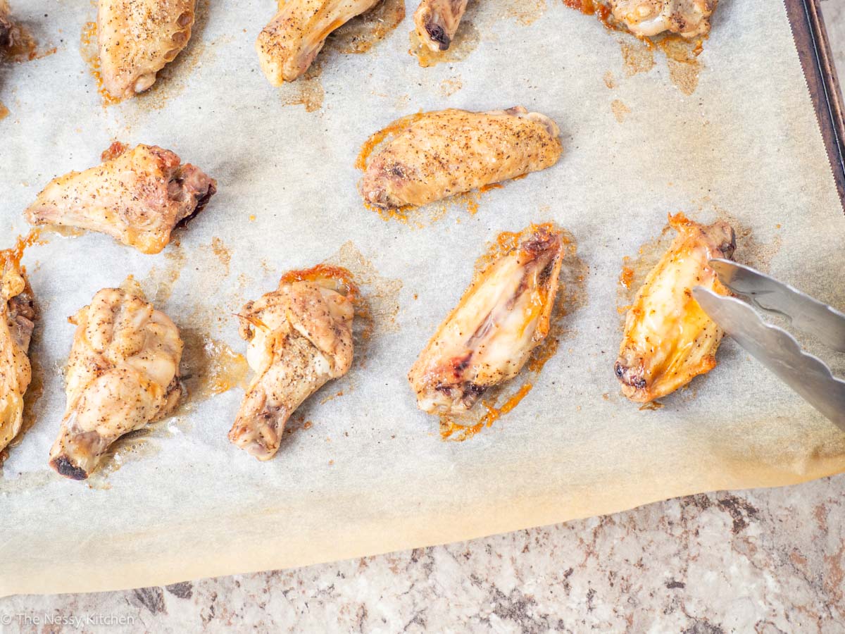 Wings on a baking sheet.