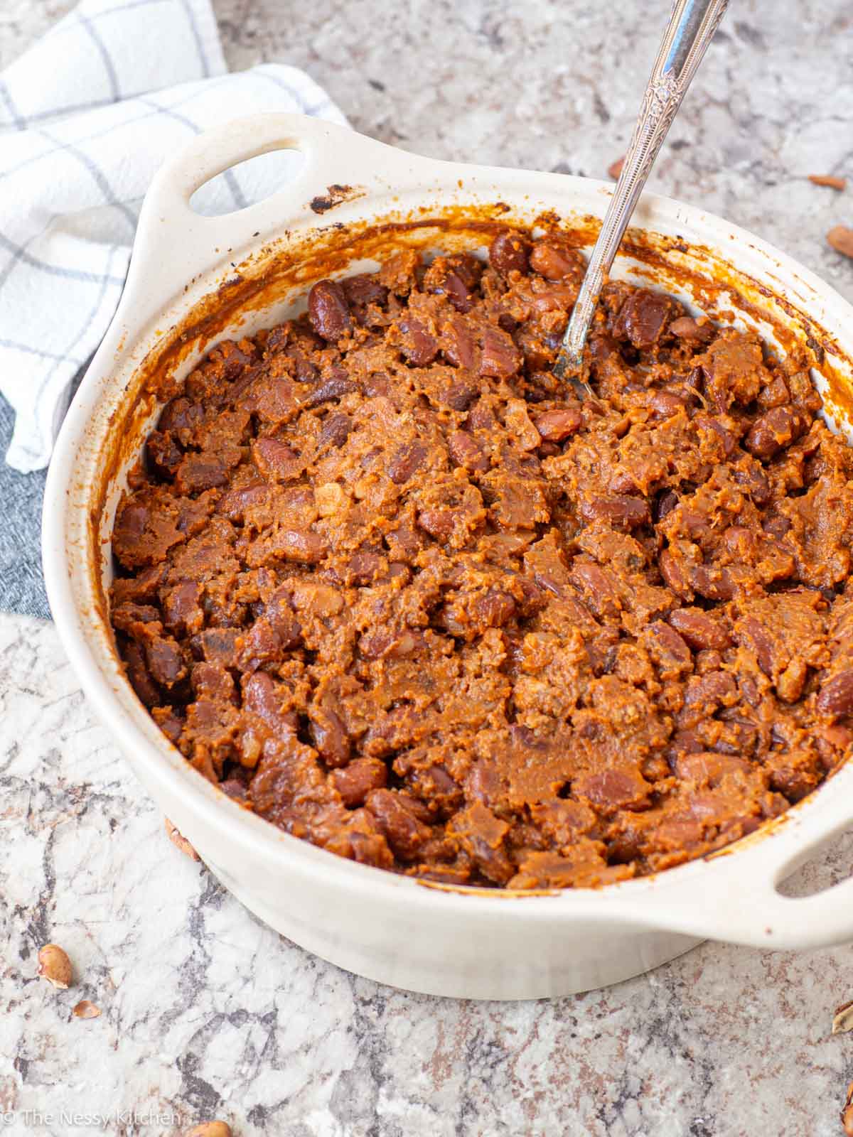 Ground beef baked beans in a dish.