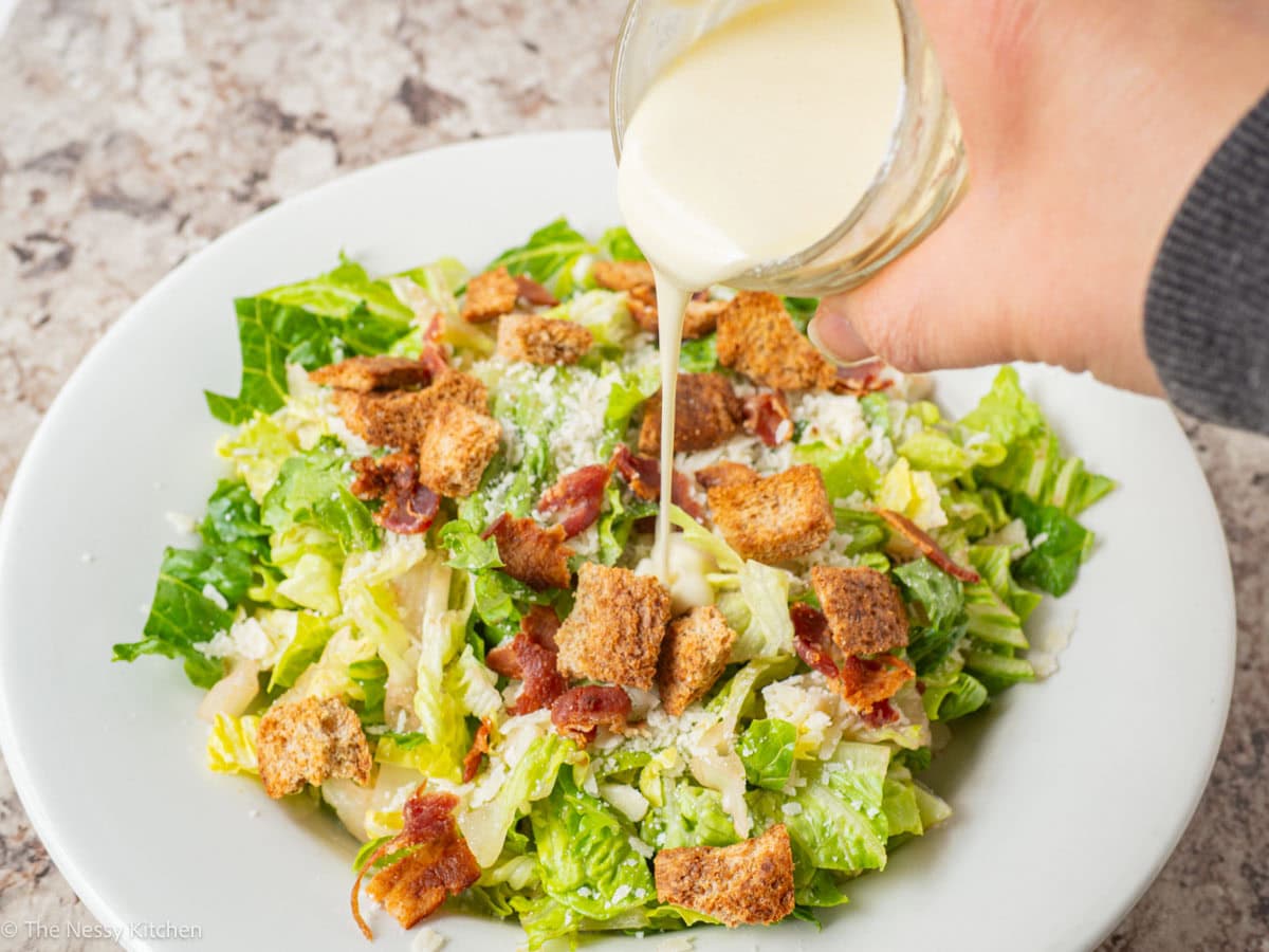 Dressing added to a salad.